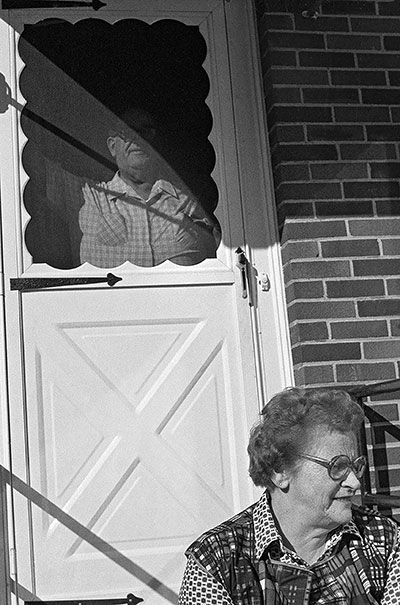 Mom, with Dad in Doorway c.1980